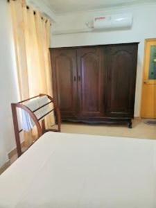 Postel nebo postele na pokoji v ubytování Anu Homestay