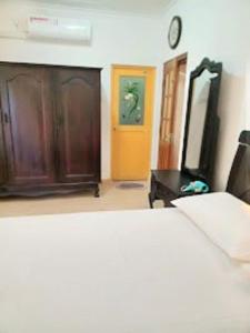 Postel nebo postele na pokoji v ubytování Anu Homestay