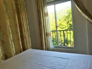 Postel nebo postele na pokoji v ubytování Anu Homestay