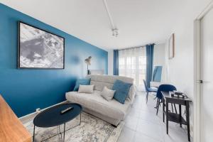 Χώρος καθιστικού στο Votre pied-à-terre Parisien à Montreuil-Fontenay