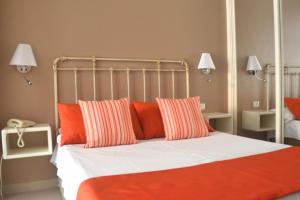 Ein Bett oder Betten in einem Zimmer der Unterkunft Hotel RF Astoria - Adults Only