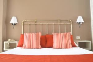 Ein Bett oder Betten in einem Zimmer der Unterkunft Hotel RF Astoria - Adults Only