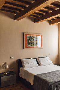 Postel nebo postele na pokoji v ubytování Podere Biricocolo - Il Cortile
