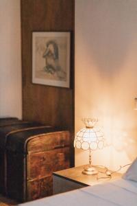 Postel nebo postele na pokoji v ubytování Podere Biricocolo - Il Cortile
