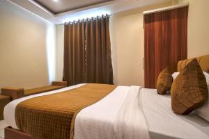 Voodi või voodid majutusasutuse Radhe Krishna Resort toas
