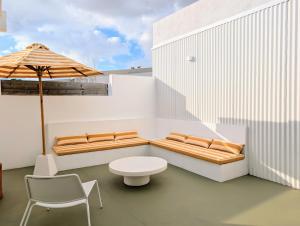 Posezení v ubytování Maison Lemonade, parenthèse sucrée avec piscine