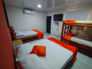 Postel nebo postele na pokoji v ubytování WAYANAY TAYRONA ECO HOSTEL + 64 fotografií