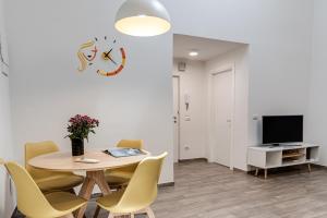 A television and/or entertainment centre at Serenity - Sweet Dreams in Florence Még 14 kép