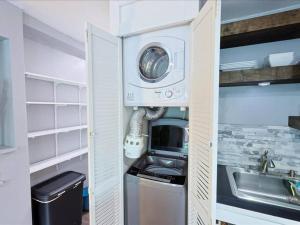 Kuchyň nebo kuchyňský kout v ubytování Lux Apt