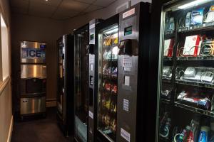 a room with several vending machines in a store at Strand Palace in London