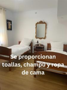 Postel nebo postele na pokoji v ubytování Cómodo hogar en Cistierna