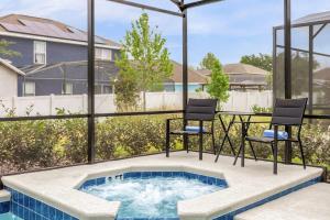 The swimming pool at or close to Upstay Ultimate Orlando Retreat w Pool & Hot Tub Sleeps 16