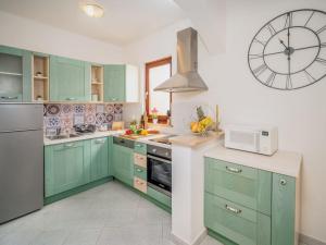 Η κουζίνα ή μικρή κουζίνα στο Villa Chiara