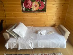 Postel nebo postele na pokoji v ubytování Garden rooms in Kutaisi