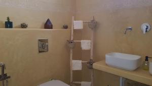 Bathroom sa Gîte ferme avec piscine privée