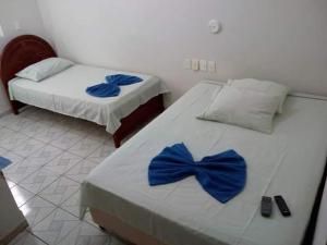 Postel nebo postele na pokoji v ubytování Terraço Hotel