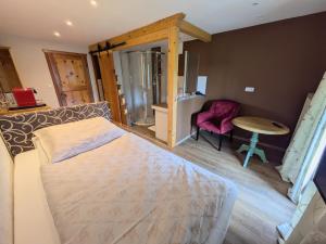 Voodi või voodid majutusasutuse Pension Kirchleitn toas
