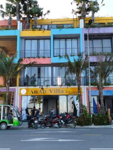 a group of motorcycles parked in front of a building at AnAn Villa - Hải Tiến in Nam Khê