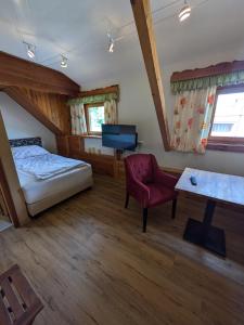 Postel nebo postele na pokoji v ubytování Pension Kirchleitn