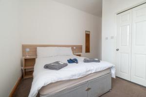 Postel nebo postele na pokoji v ubytování Moonside Rooms