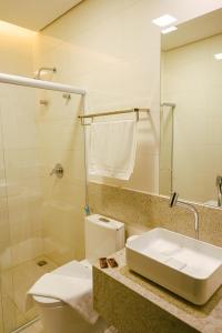 Koupelna v ubytování Oásis Hotel
