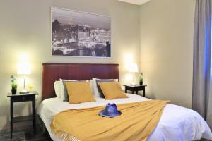 Postel nebo postele na pokoji v ubytování Villa Maruja