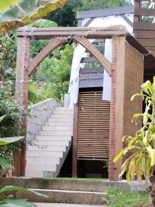 a set of stairs leading up to a building at Mankao in Les Trois-Îlets