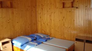 Posteľ alebo postele v izbe v ubytovaní Pokoje Zakopane