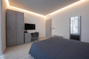 Ένα ή περισσότερα κρεβάτια σε δωμάτιο στο 240b - Camera Nord - Affittacamere Sara Home Chiavari, 200Metri dal Mare