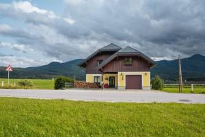 a house on the side of a road at Appartements K62 in Bad Mitterndorf +46 photos