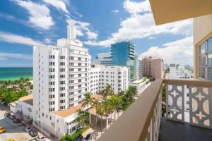 a view of a city from the balcony of a building at Scenic 1BR 1BA Retreat with Amazing Views in Miami Beach +2 photos