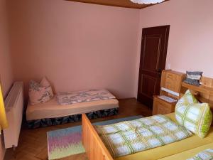 Postel nebo postele na pokoji v ubytování KochGaranas Ferienhaus