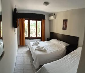 Photo de la galerie de l'établissement Palmas del Lago, à Villa Carlos Paz