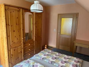 Postel nebo postele na pokoji v ubytování KochGaranas Ferienhaus
