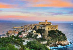 an island in the ocean with a castle at Hotel Mirasole International in Gaeta