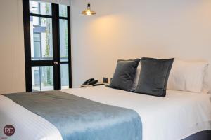 Ένα ή περισσότερα κρεβάτια σε δωμάτιο στο Hotel RDOS