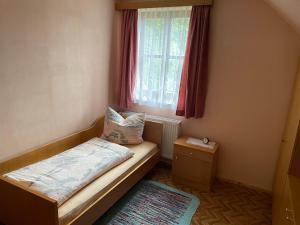 Postel nebo postele na pokoji v ubytování KochGaranas Ferienhaus