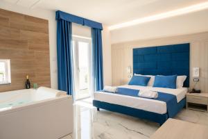 Voodi või voodid majutusasutuse Hotel Cocceio toas