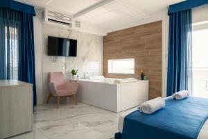Voodi või voodid majutusasutuse Hotel Cocceio toas