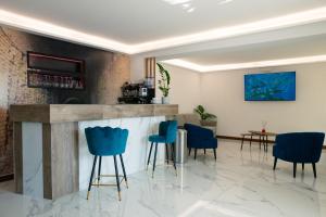 TV a/nebo společenská místnost v ubytování Hotel Cocceio