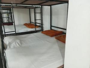 Postel nebo postele na pokoji v ubytování RL Dormitory