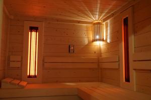 a room in a sauna with a light at Appartements K62 in Bad Mitterndorf