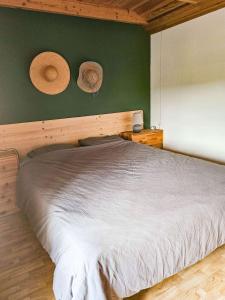Postel nebo postele na pokoji v ubytování Vue sur les collines