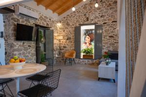 TV a/nebo společenská místnost v ubytování Centro Stone House