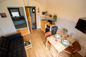 an aerial view of a tiny house with a dining table at Ben Nevis Pod in Fort William