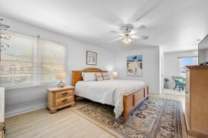 En eller flere senge i et værelse på Sweet Home Alabama