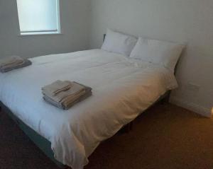 Postel nebo postele na pokoji v ubytování Kilkee Moore bay
