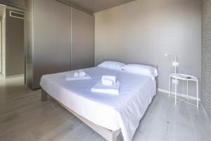 Postel nebo postele na pokoji v ubytování IseoLakeRental - Casa Divina
