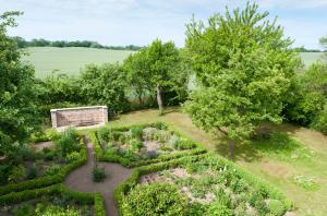 an overhead view of a garden with trees at Ferienhaus Kastanie - Klein Siemen in Kröpelin