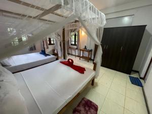 Letto o letti in una camera di Abinu"s Place